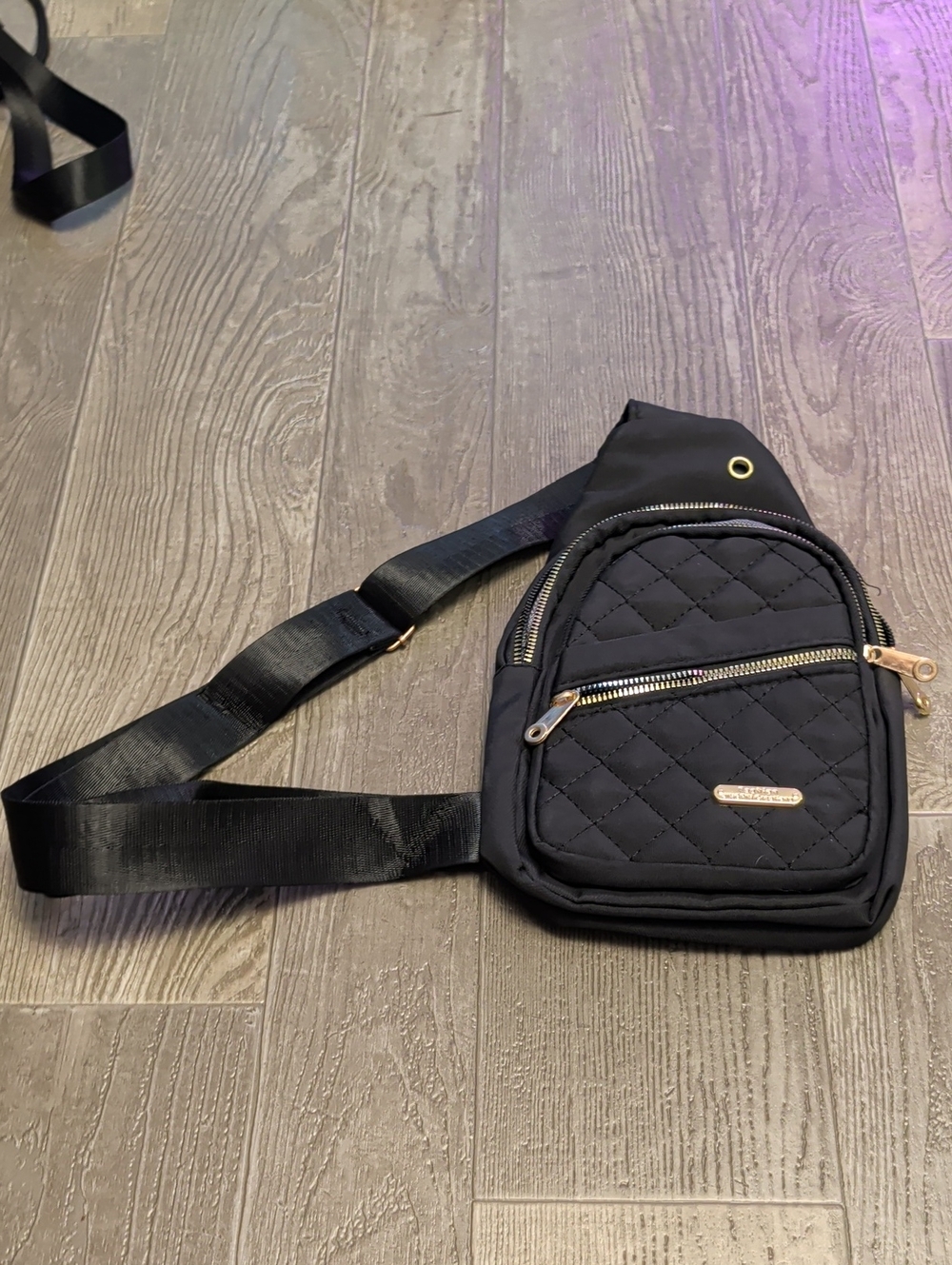 Quilted Black Sling Bag with Gold Accents by
